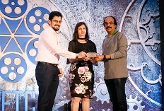 IIFTC Awards – Representatives of Swiss Air presenting to B L Nagaraj for Amar